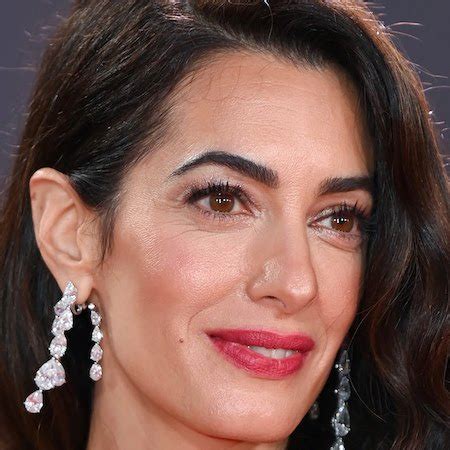 Amal Clooney Shuts Down the Albies Red Carpet in a Plunging .